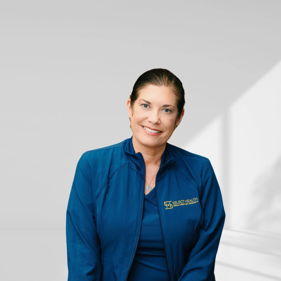 Lena Gokey, owner and founder of Select Health, seated in a white chair